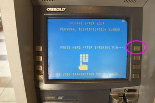 暗証番号入力後画面横のボタンを押すタイプ